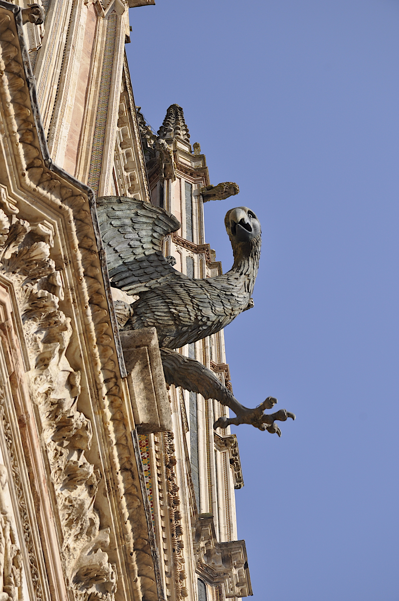 Bronze eagle mounted on the facade of the Orvieto Duomo