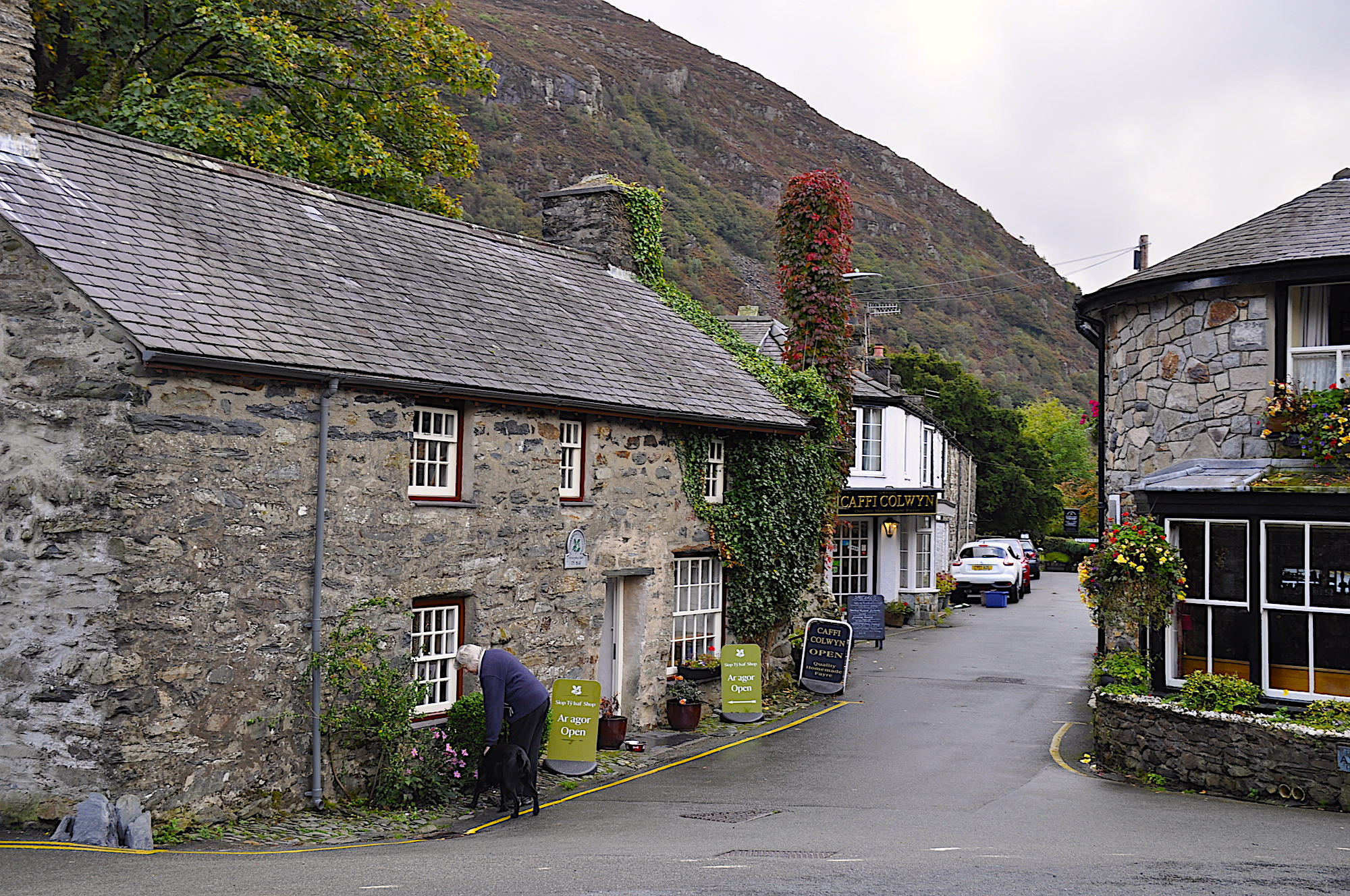 The shops and taverns of Beddgelert brimming with flowers, ivy and beautiful food, drink and locally made products.
