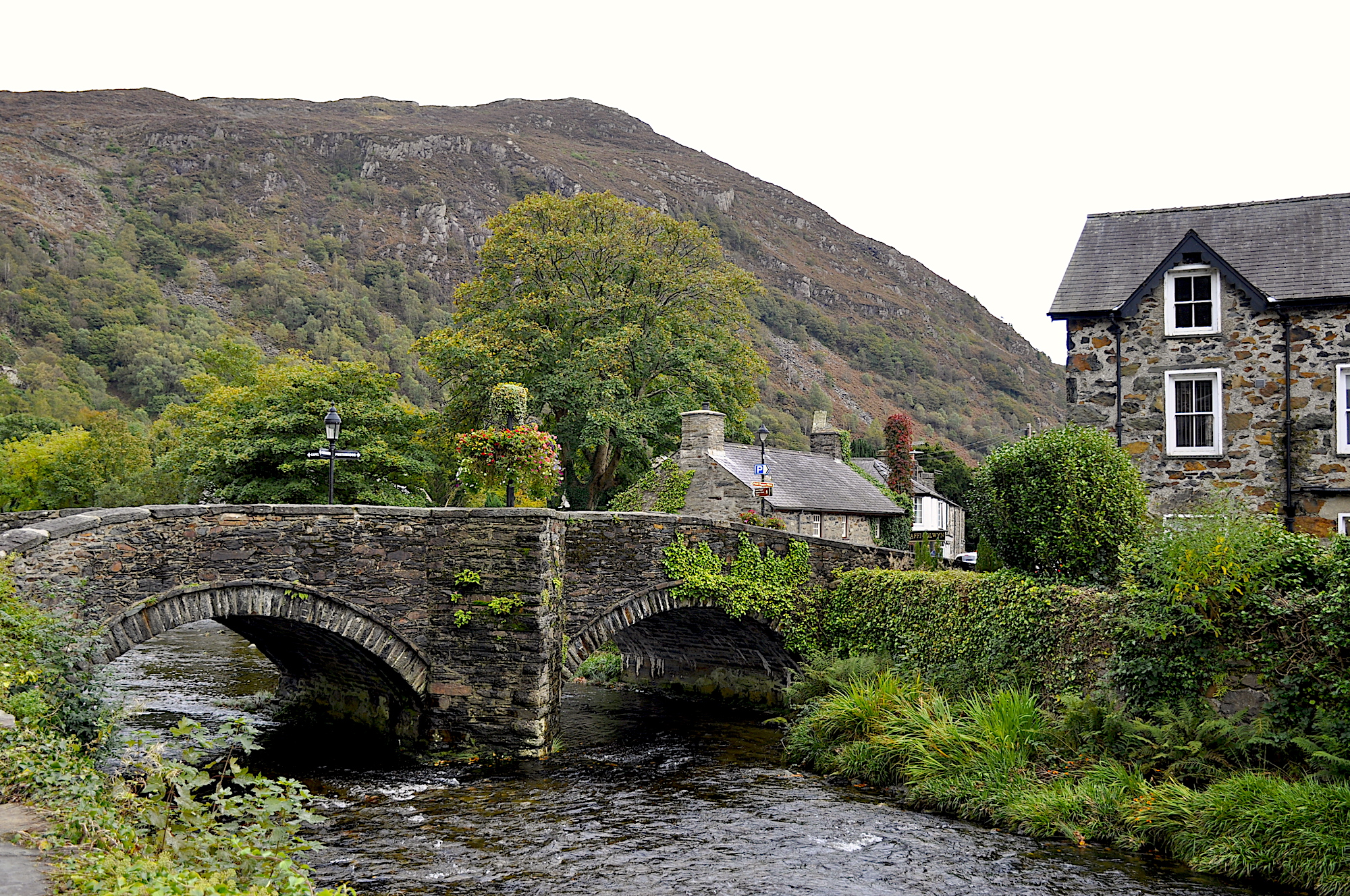 The beautiful mountains surrounding Beddgelert help to hide the picturesque village of Beddgelert.